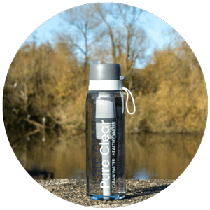 Pure Clear® active water filter bottle in outdoor setting, showcasing advanced filtration technology for clean, healthy water.